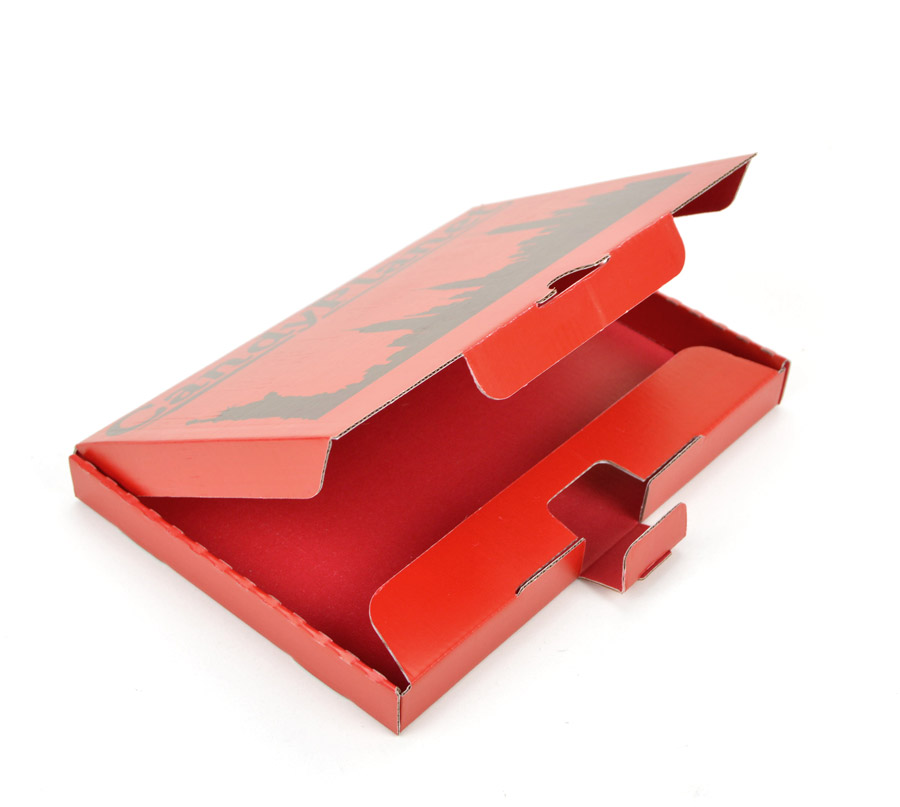 A red e-commerce printed box with a black London skyline silhouette and branded text on the upper outer lid of the box