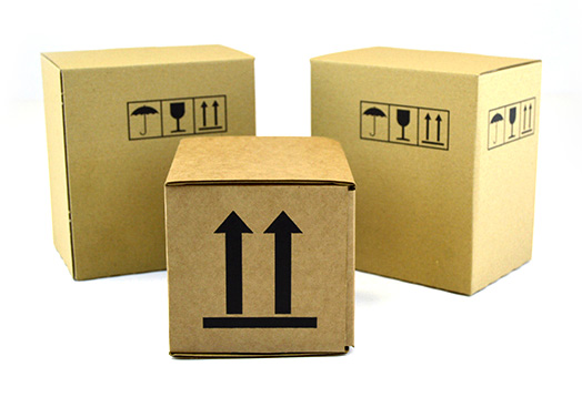 A selection of glue case boxes with basic arrow 'this way up', fragile and protect from moisture icons