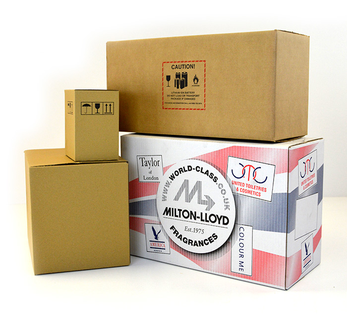 A selection of glue and crash lock boxes. This includes a Milton-Lloyd fragrances example which is a white box with red and blue flashes and a number of business related logos