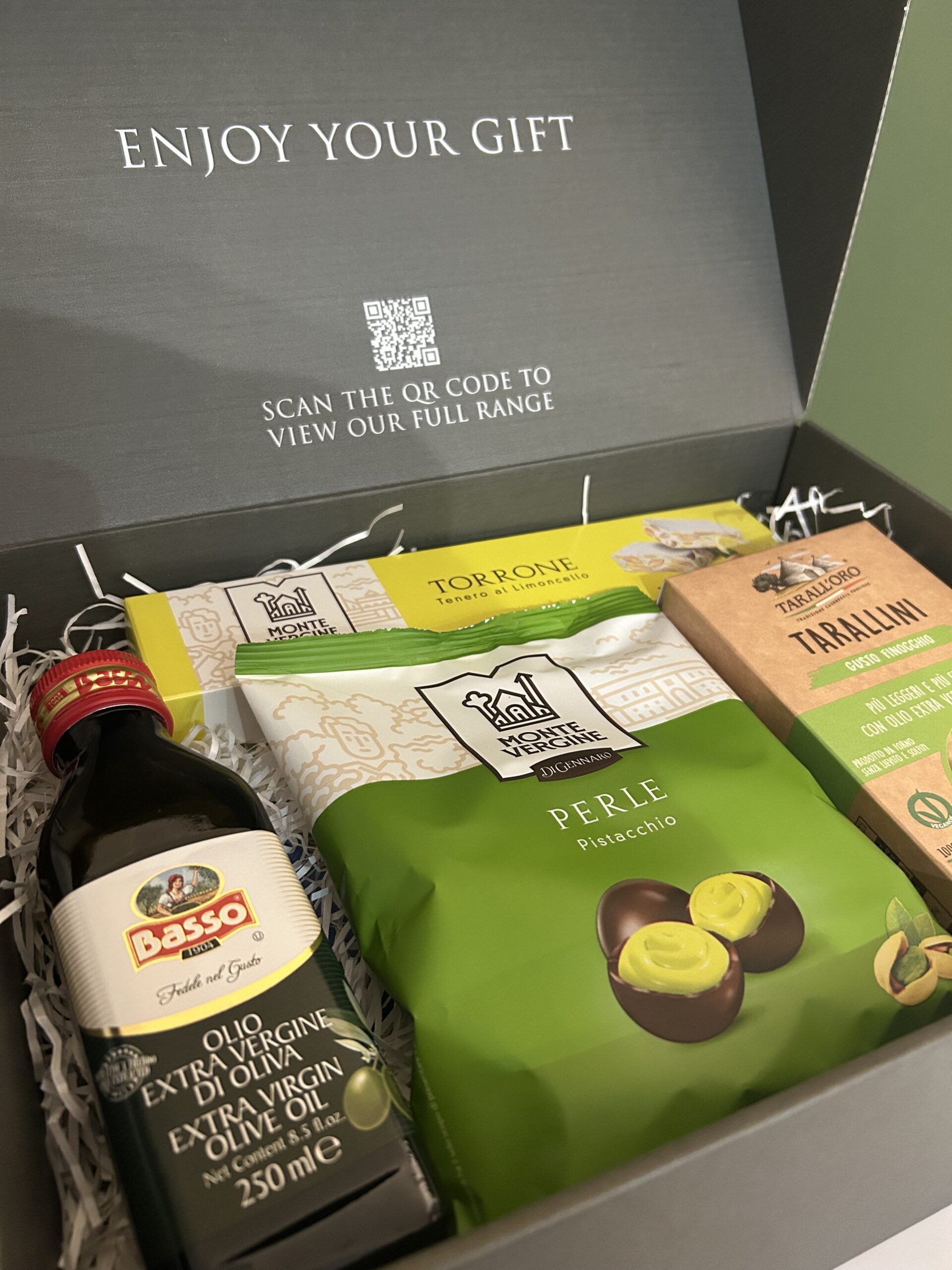Inside the Fontanellas hamper box with printed lid and gift products